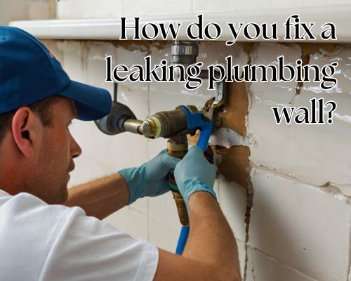 a plumber fixing a leaking pipe in the wall