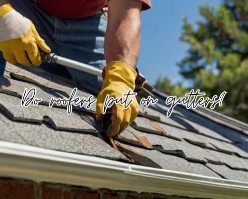 a roofer working on roof and gutters
